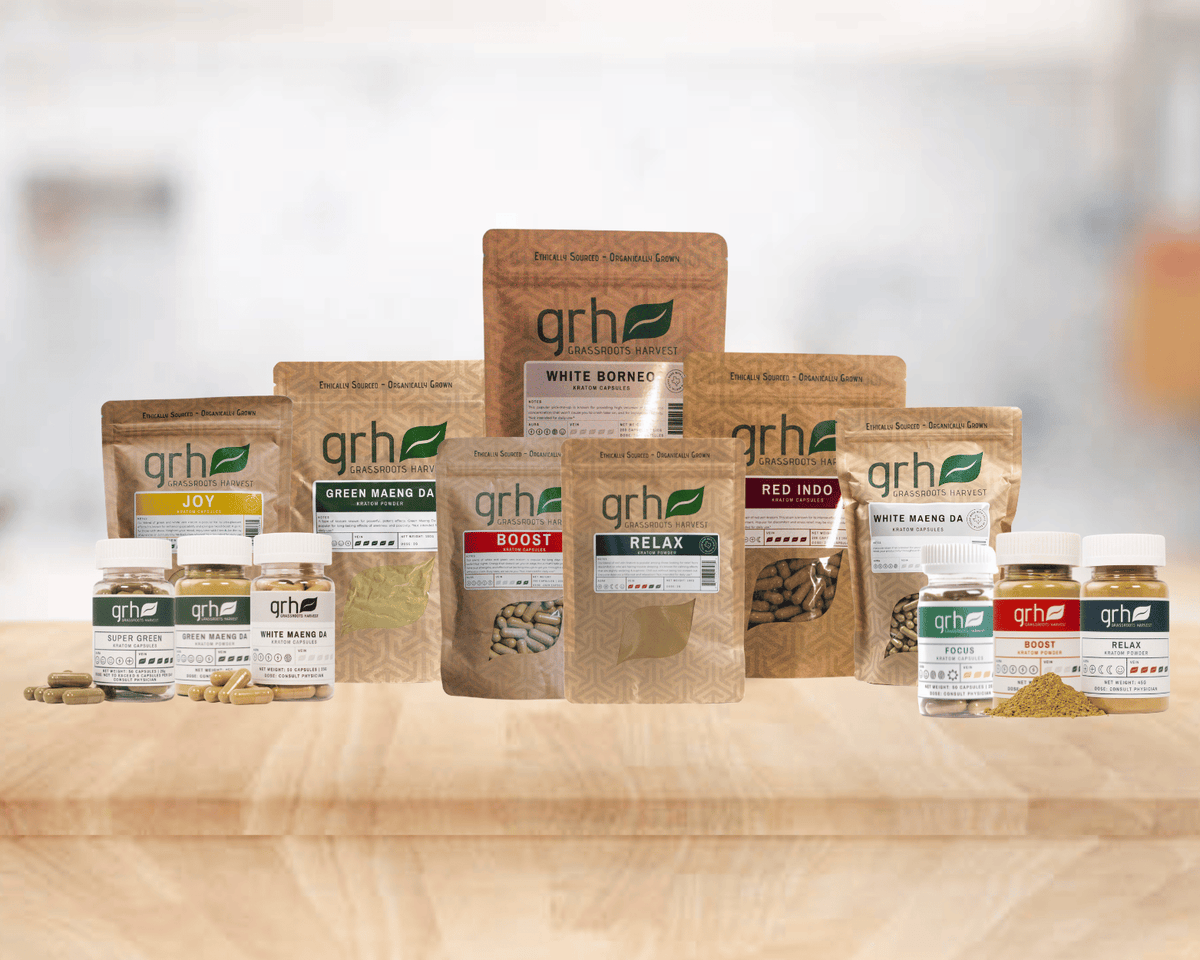 GRH Kratom powders, capsules and blends on a wood counter